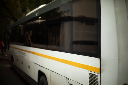 Bus in city. Public transport in parking lot. Bus details. photo
