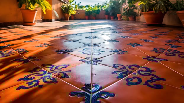 A tiled floor with blue and red designs photo