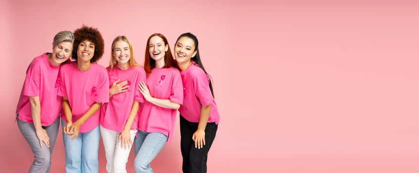 Diverse group of women embracing life and supporting breast cancer awareness photo