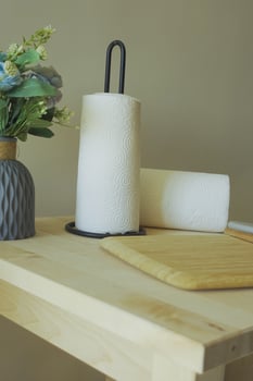 Charming Kitchen Decor Ideas Featuring Paper Towels Alongside a Lovely Flower Arrangement photo