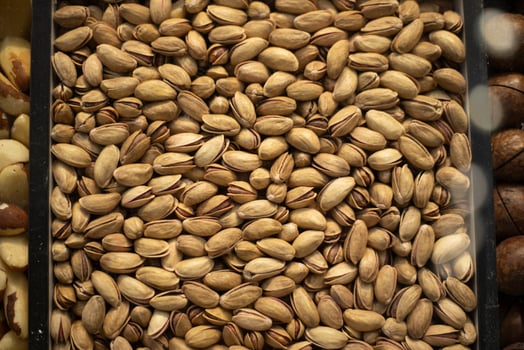 Pistachio texture. Sale of nuts. Roasted pistachios. photo