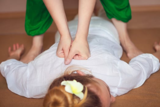 Young woman having massage treatment photo