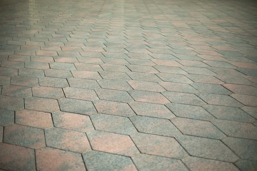 Tiles in city. Tratoir in details. Surface of road. photo