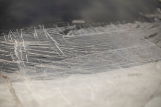 Adhesive tape on car. Sealed area on material. Sealed broken glass. photo