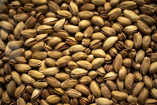 Pistachio texture. Sale of nuts. Roasted pistachios. photo