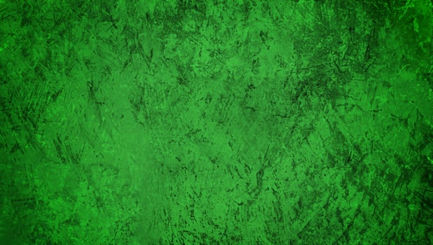 Green textured grunge background with rough and distressed surface, perfect for design, backdrop, or artistic projects. photo