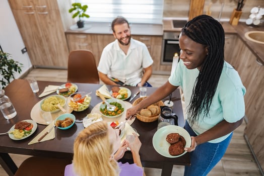 Celebrating friendship with a cozy dinner at home photo
