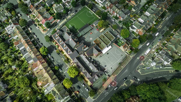 Aerial view from a drone flying above green Brighton streets in summer, East Sussex, UK photo