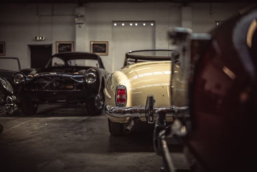 Classic cars being restored in a vintage vehicle garage workshop photo