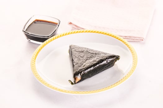 Japanese traditional onigiri with fish photo