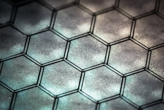 Small pentagons, parts laser cut in metal, close up photo
