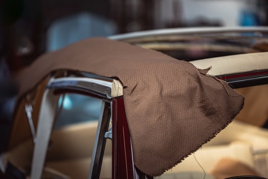 Classic car interior restoration process in a garage photo