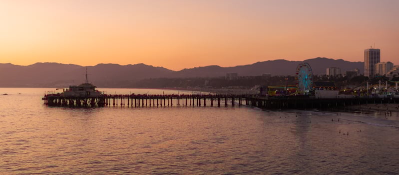 Santa Monica Pier at Sunset with Ferris Wheel Silhouette photo