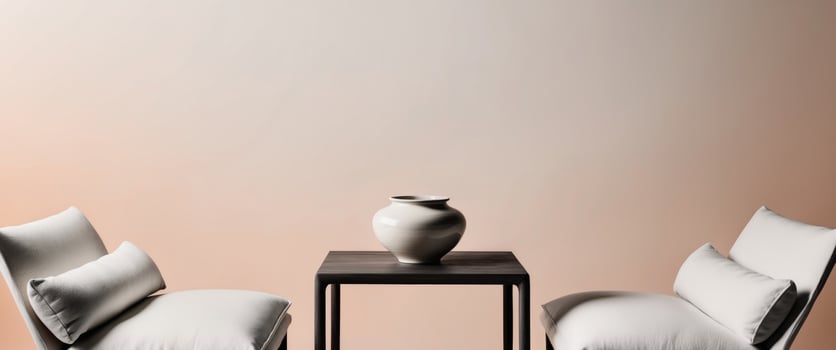 A monochromatic image depicting two seats and a table with a pot positioned atop it. photo