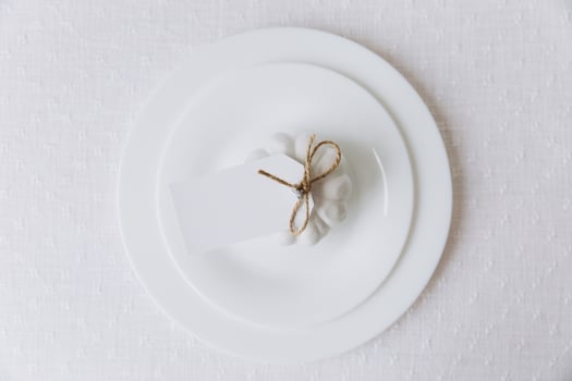 Thanksgiving set. Table setting, white plates with pumpkin, mockup, top view photo