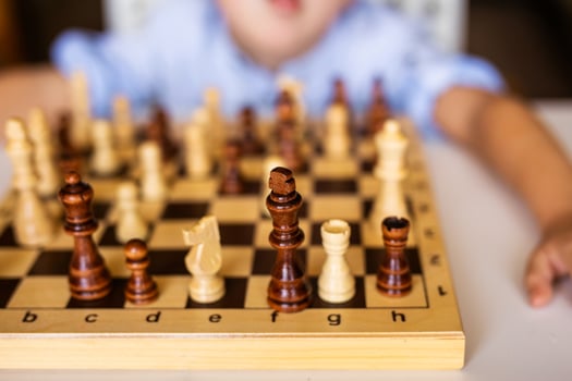 Brass chess on table in living room photo