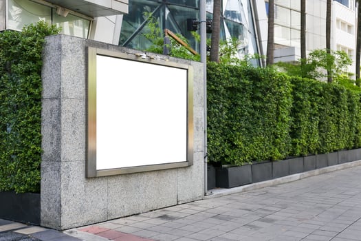 Mockup image of Blank billboard white screen posters and led outside building for advertising photo