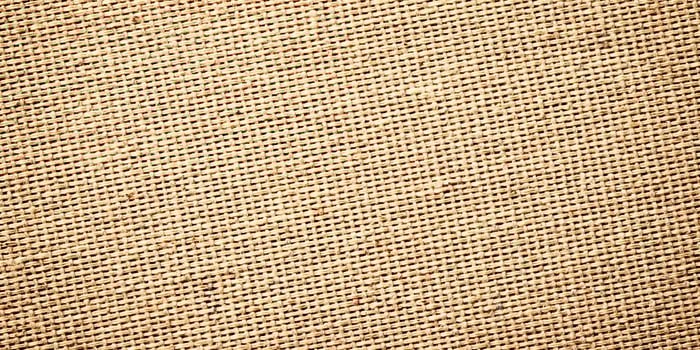 brown tablecloth from sackcloth as background. natural fabric texture photo
