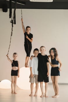 Portrait of a group of children in the fitness room. Children's yoga photo