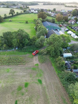 High Angle View of British Agricultural Farms at Streatley Village and Countryside Landscape of Bedfordshire, England Great Britain of UK. Footage Was Captured with Drone's Camera on October 7th, 2024 photo