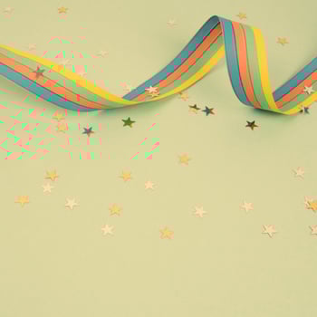 ribbon and stars on green background photo