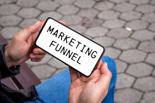 Marketing funnel message written on smartphone screen. Conceptual marketing funnel symbol. Copy space. photo