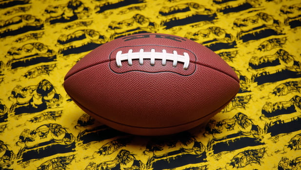 illustration showcasing an American football within a sportsthemed design highlighting the iconic shape of the ball during competition photo