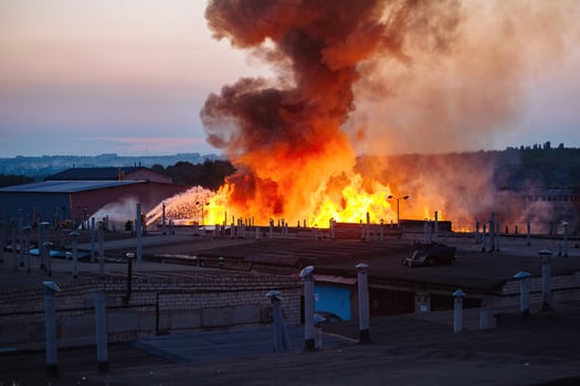 Large blaze at burning industrial building photo