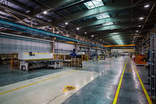 Metalworking factory production line. Interior of the workshop photo