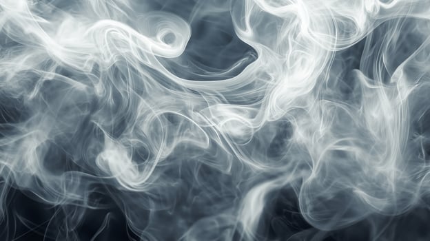 A blue smokey background with a white smokey line. The smoke is thick and dark photo