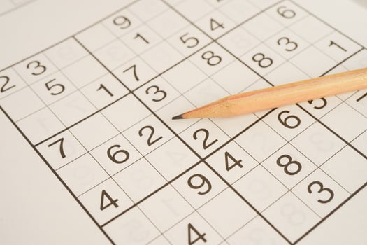 Sudoku puzzle, game to play for keep you brain younger for developing Alzheimer disease in senior patient. photo