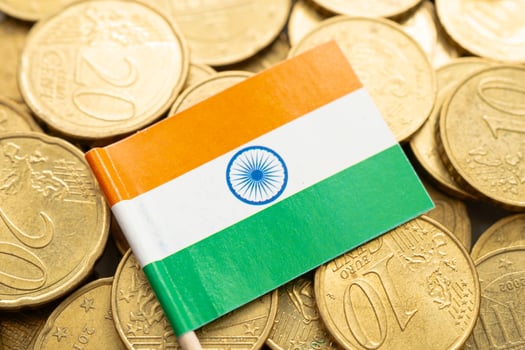 India flag on gold coins, finance and banking business. photo