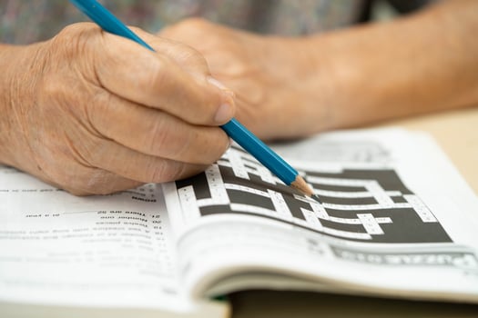 Bangkok, Thailand June 1, 2024 Alzheimer disease AD, Asian elderly woman playing sudoku puzzle game. photo