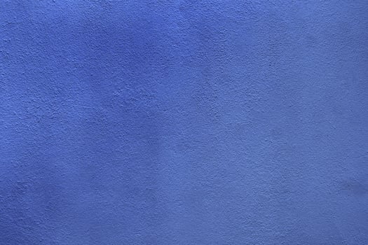 Textured Blue Wall Background with Subtle Variations in Hue for Design and Creative Projects photo