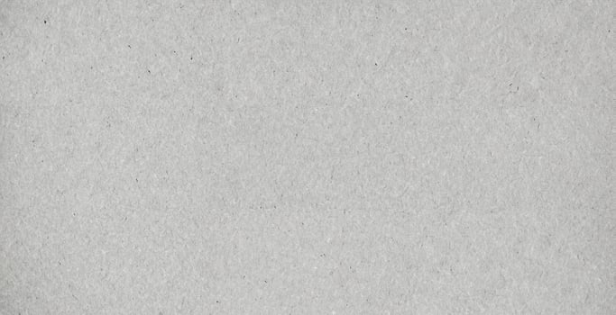 Light gray recycled paper texture, ideal for backgrounds in design, packaging, and eco-friendly projects. photo