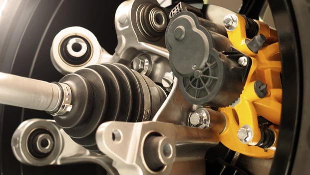 Car suspension and drive shaft. Structure of EV car spare parts. Such as Front or Rear suspension Shock absorber suspension Brake. Elements of the suspension and Chassis structure. Car service repair. photo
