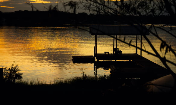 Shimmering Gold Florida Lake Silhouette Nature Background photo