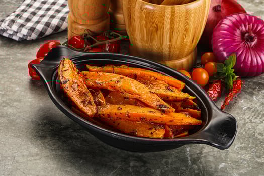 Baked batat with with spices photo