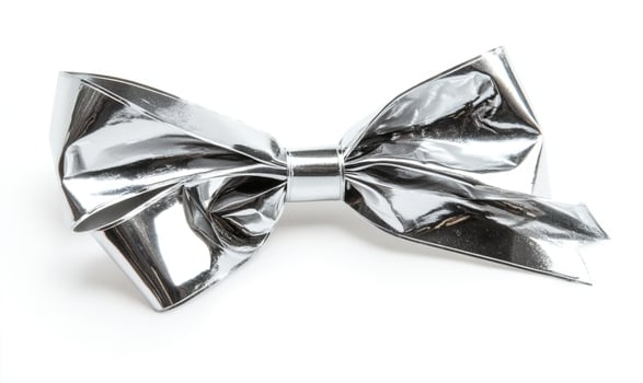 A silver bow is on a white background photo