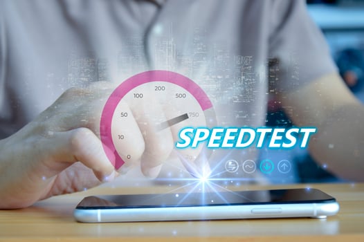 fast internet connection speedtest network bandwidth technology Man using high speed internet with smartphone and laptop computer. 5G quality, speed optimization. photo