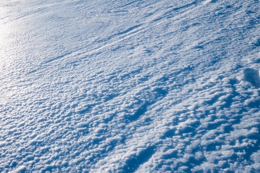 Blue frost ice snow floor on hill photo