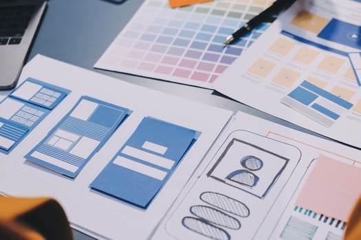 The designer team is designing the uxui system to make the uxui system work well on new phones and support system updates. Website development concept UI UX front end designer photo
