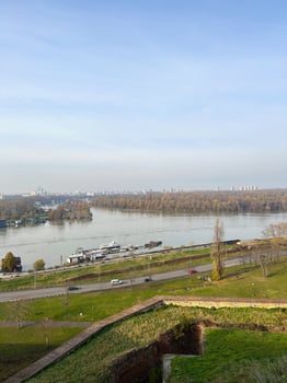 Looking across the Sava river in Belgrade, river boats and restaurants in autumn season. photo