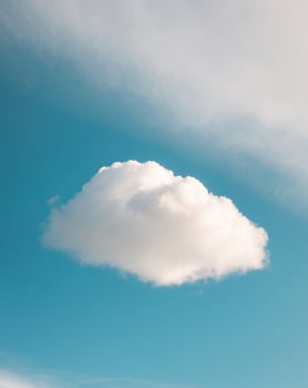 A white cloud is in the sky photo