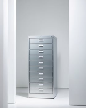 A silver filing cabinet with six drawers photo