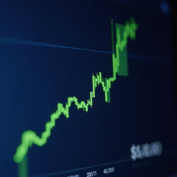 A dynamic stock market graph shows financial growth and investment success depicted as a green upward line against a dark blue background photo