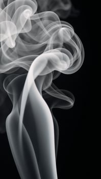 Abstract paranormal misty smoke against an isolated black backdrop textured with overlay effects to create eerie cloudlike forms for movie scene imagery photo