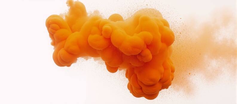 Bright orange colored powder festive explosion on a pure white background photo
