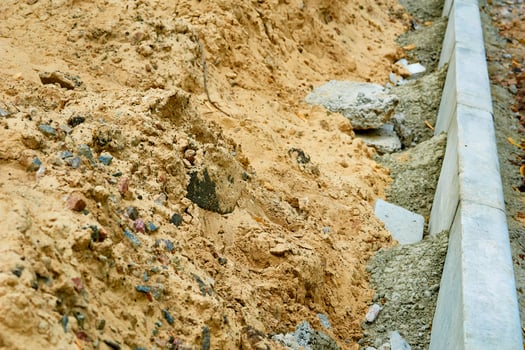 Roadbed with construction sand prepare for asphalt laying photo