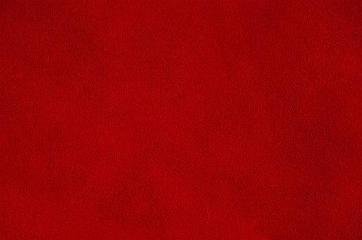 Red suede background macro photo. Suede texture. photo